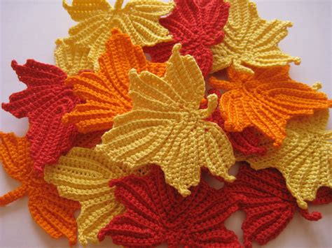 Crocheted with an all-white thread, and colored after they are finished using fabric dye. . Oak leaf crochet pattern